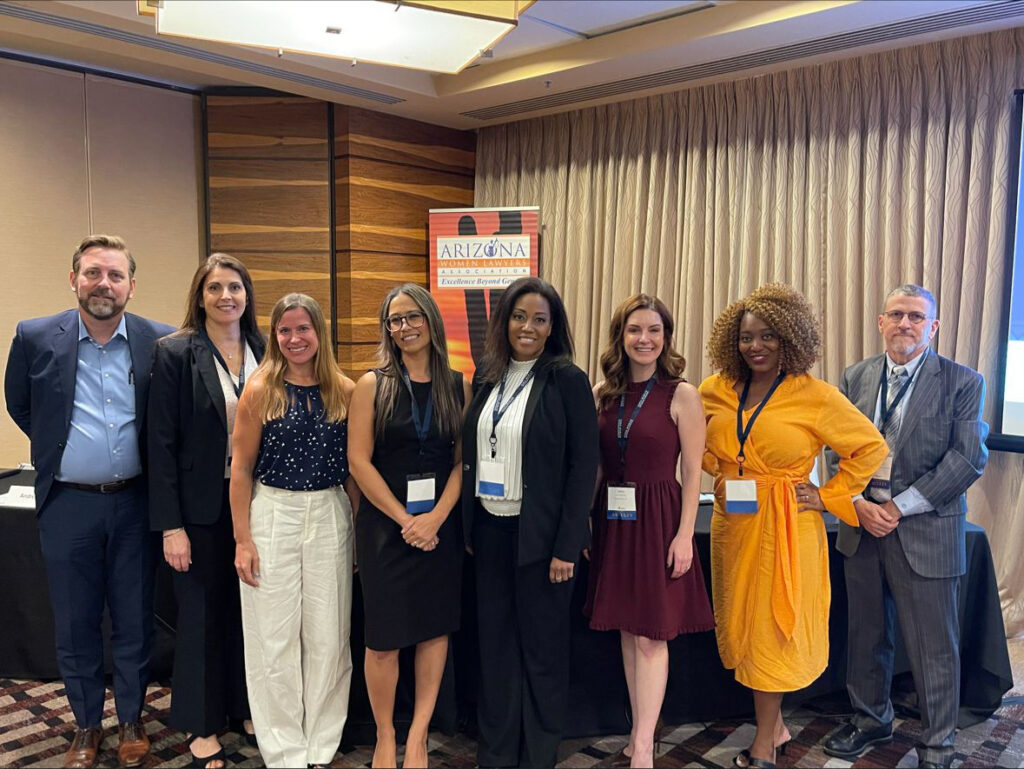 Firm attorneys at an Arizona Women Lawyers Association conference.
